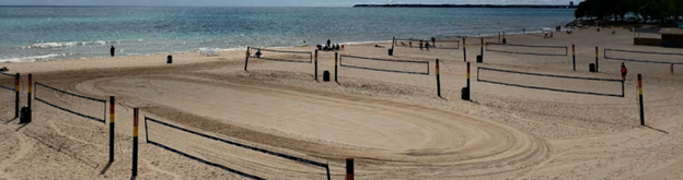 beach with volleyball nets